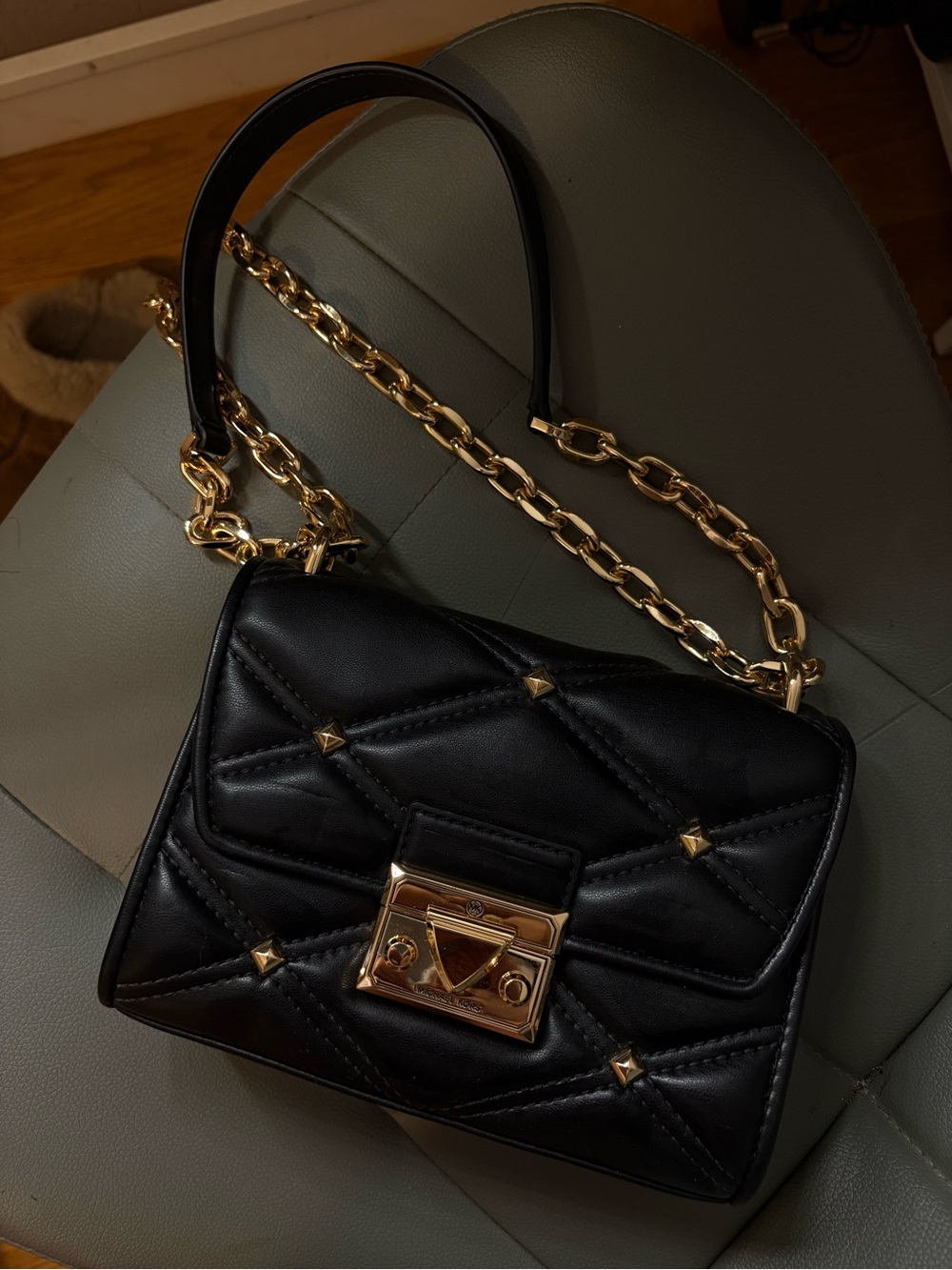 Black Quilted Leather Shoulder Bag with Gold Chain